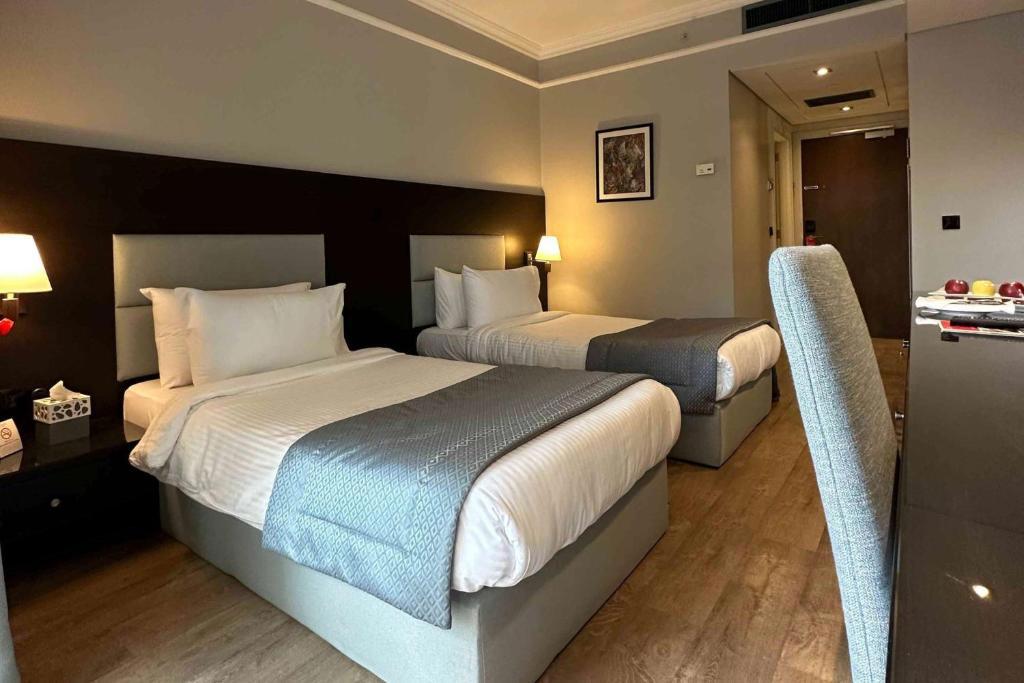 Отдых Hotel Ramada by Wyndham Downtown 5* - Habitación