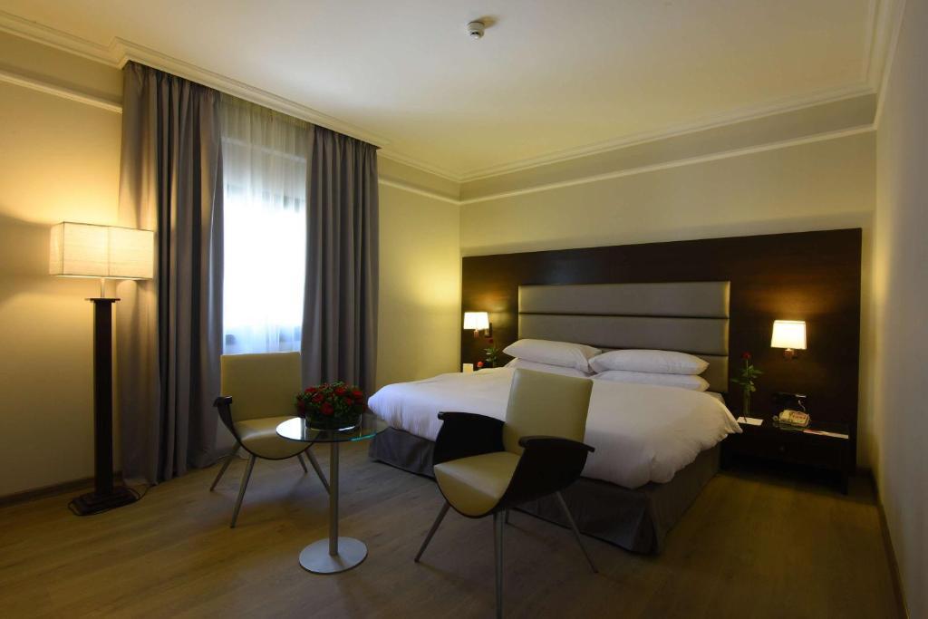 Отдых Hotel Ramada by Wyndham Downtown 5* - Habitación